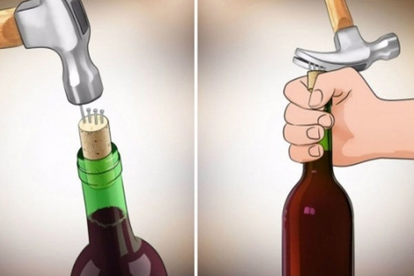 ¿Descorche de una botella de vino con clavos y un martillo?