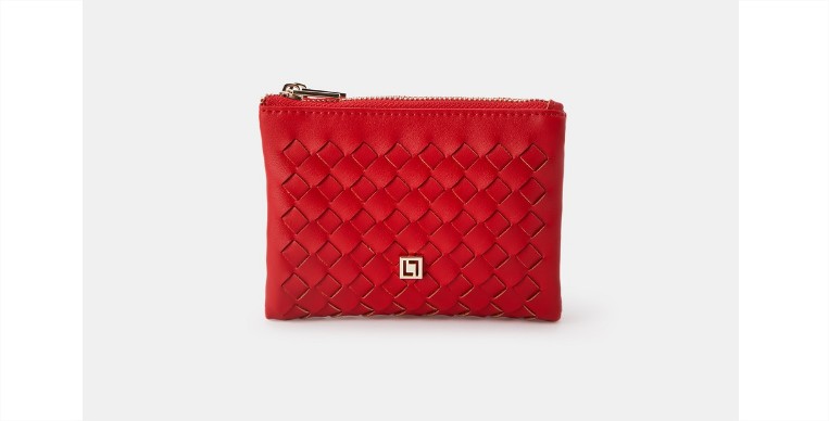 Cartera pequeña trenzada en tono rojo con automáticosel corte inglés