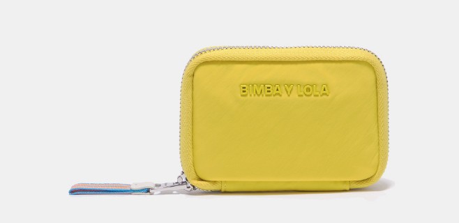 cartera ovalada nylon amarilla bimba y lola el corte ingles