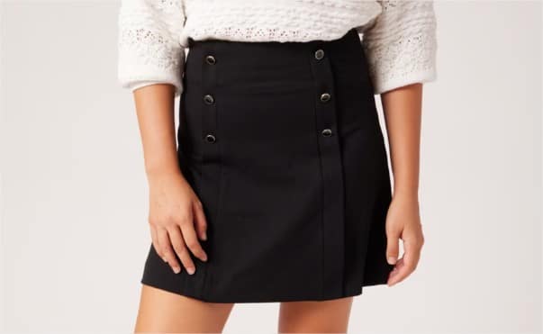 Falda Corta Con Tejido Liso Y Diseño De Tablas El Corte Ingles