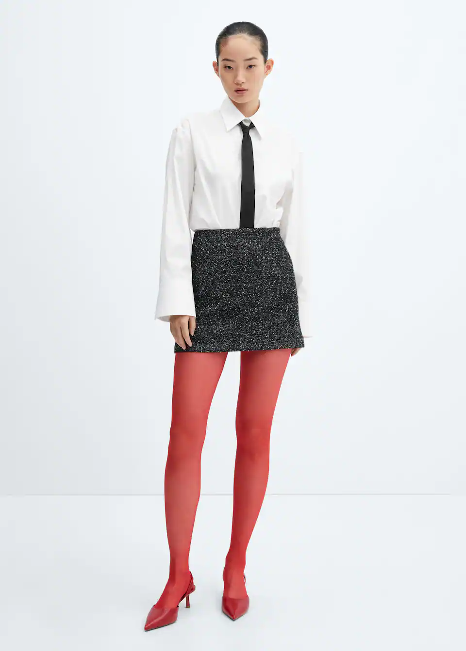 Falda tweed jaspeada de Mango